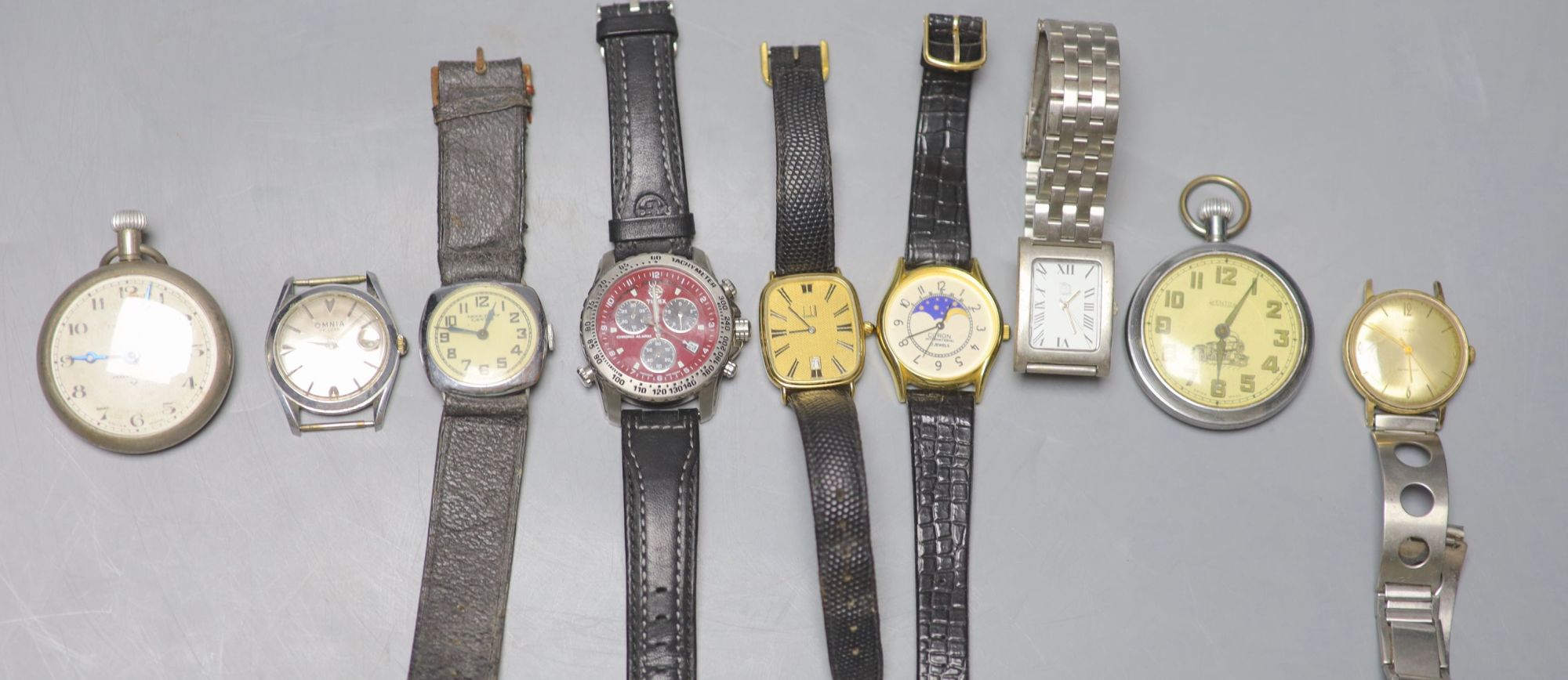 Seven assorted wrist watches including two Timex and an Omnia and two pocket watches.